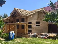 Гаражи из оцилиндрованного бревна и бруса