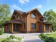 Деревянный дом с террасой и мансардой