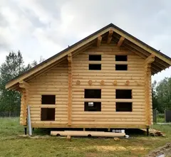 Загородные и дачные дома с мансардой из срубов в современном стиле