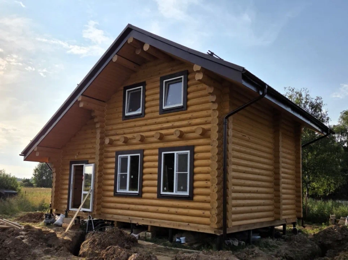Загородные и дачные дома с мансардой из срубов в современном стиле