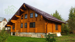Дома из оцилиндрованного бревна в стиле шале 200 м²