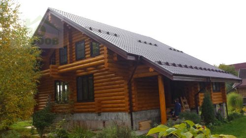 Дома из оцилиндрованного бревна в стиле шале 200 м²