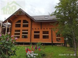 Загородный дом с мансардой из бревна #867