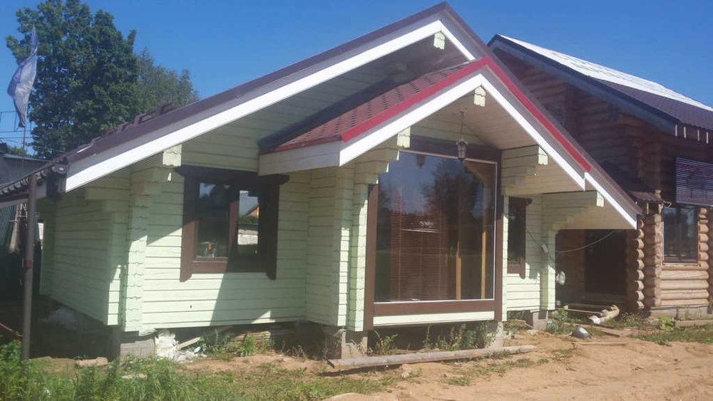 Дом из бруса 8 х8 с эркером